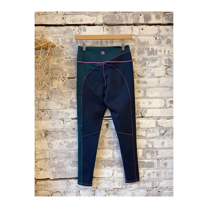 Women's Wool Sculpt Merino Baselayer Leggings by Seniq, featuring soft, fitted Merino wool fabric and a sleek, comfortable design.