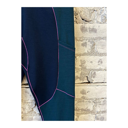 Women's Wool Sculpt Merino Baselayer Leggings by Seniq, featuring a snug fit, soft merino wool fabric, and sleek design.