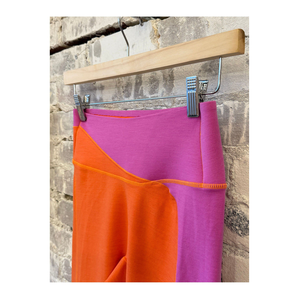 Women's Wool Sculpt Merino Baselayer Leggings by Seniq, close-up showing soft, fitted maroon leggings with seamless design.