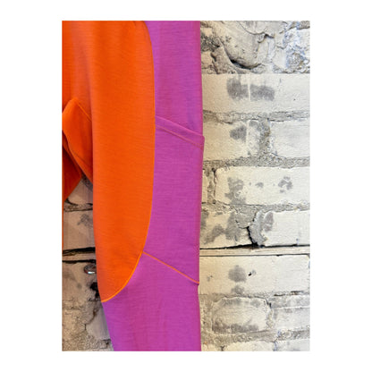 Women's Wool Sculpt Merino Baselayer Legging by Seniq, spicy-colored thermal leggings with a snug fit and soft merino wool fabric.