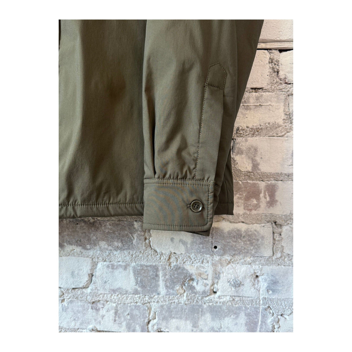 Men's Aspesi Yoshitaka cotton nylon shirt jacket in military style, featuring a casual fit with button-front and chest pockets.