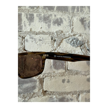 Men's Barton Perreira Zander sunglasses with Sulcata Tortoise and Espresso frames, showing the stylish, rounded eyewear design.