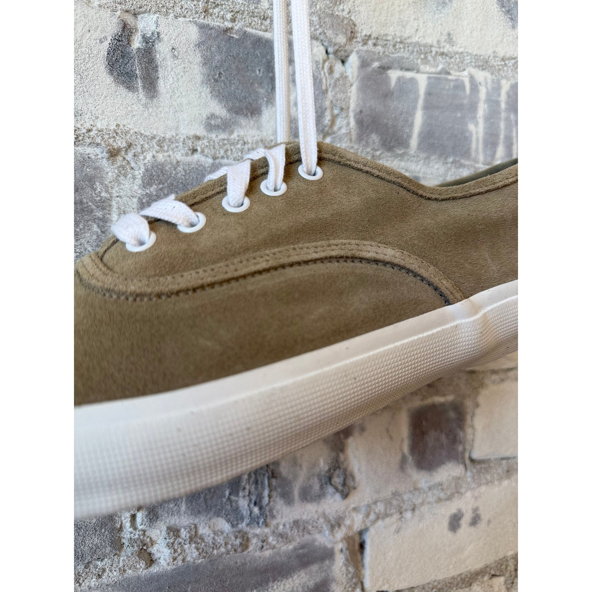 Men's beige suede ZDA Marathon Military Trainer with white sole, by Reproduction Of Found x ZDA, showing side view of the sneaker.