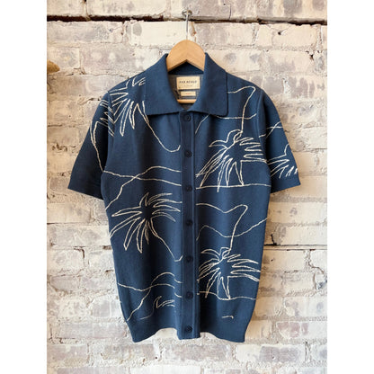 Men's Zig knitted shirt in faded navy and white palms by Far Afield, featuring a stylish, patterned knit design.