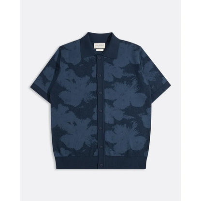 Men's Zig Knitted Shirt by Far Afield featuring a pixel floral pattern, shown in a close-up view highlighting the knit and design details.