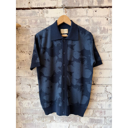Men's Zig Knitted Shirt by Far Afield featuring pixel floral pattern, with a close-up view of the colorful knitted fabric.