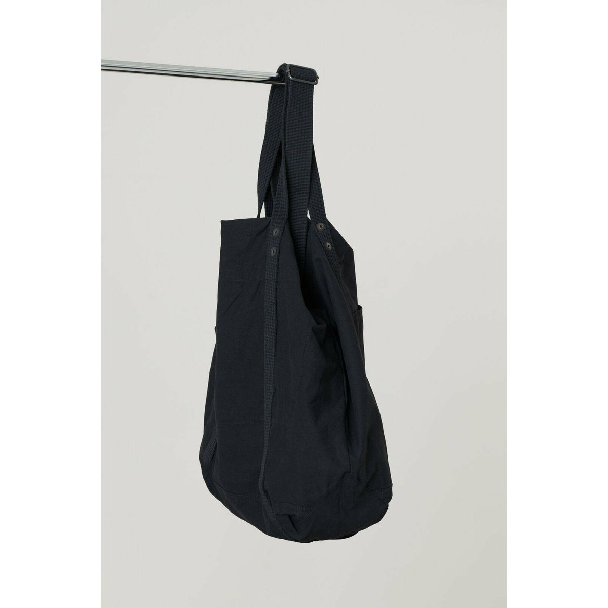 Black cotton canvas tote bag from Closed Men's accessories collection, showcasing a spacious, durable design for everyday use.
