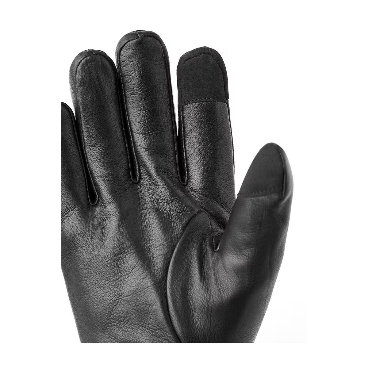 Men's Hestra John Glove in black, showing close-up of soft leather exterior and detailed stitching.