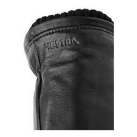 Men's Hestra John Glove in black showing the sleek leather design and detailed stitching.